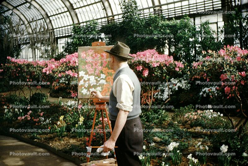 Man Painting Flowers in an Arboretum