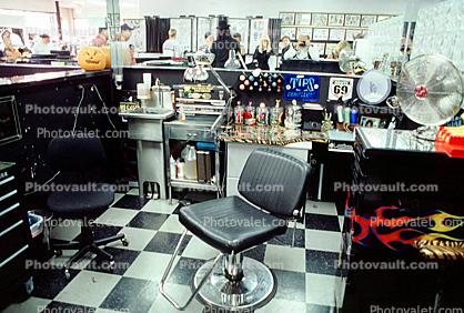 Tattoo Parlor, chair, fan, paints, inks