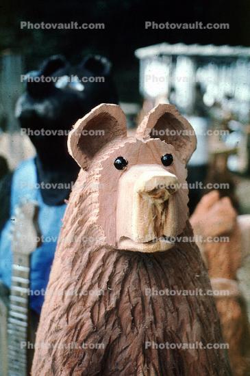 wooden bear face sculpture