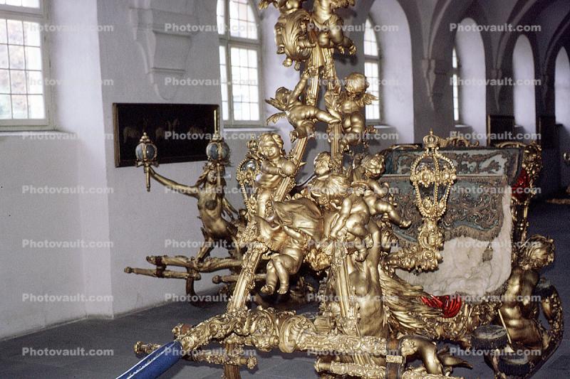 Ornate sled, gilded gold, opulant