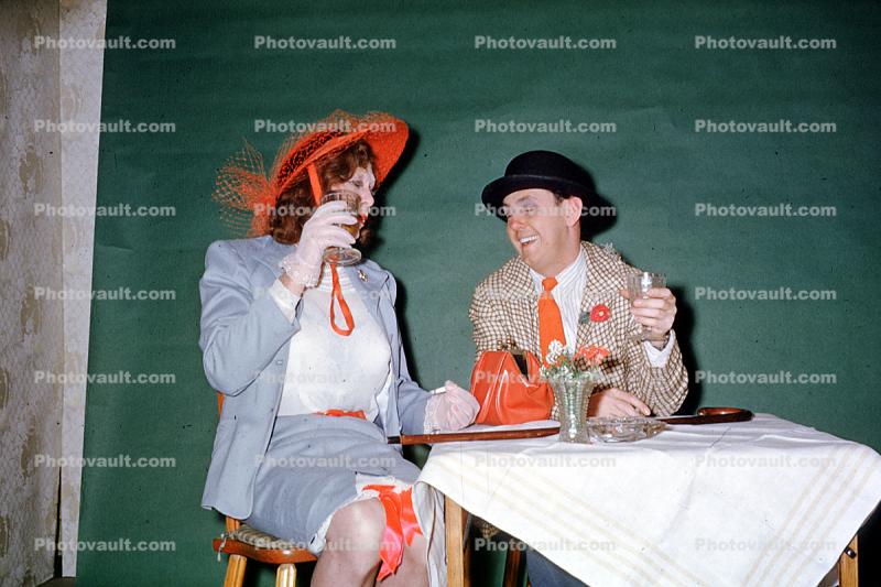 Couple getting drunk, costume, table, 1950s