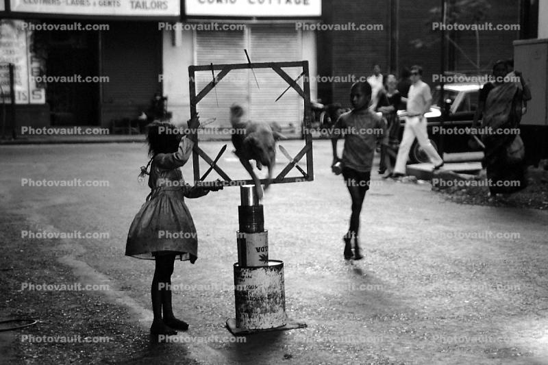 Girl and her Dog, Jumping through hoops, Mumbai