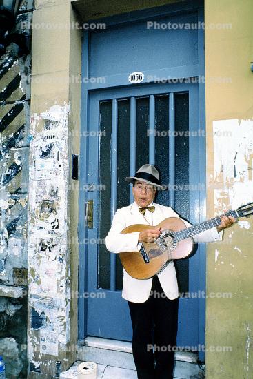 Guitar, man, doorway, Buenos Aires, Argentina