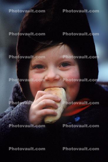 Boy eating Bread