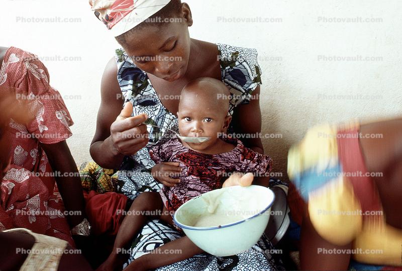 Mother Feeding a Child, Well Baby Clinic