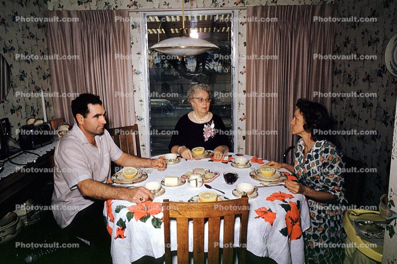 Dinner Party, Table Setting, women, men, curtains, 1950s