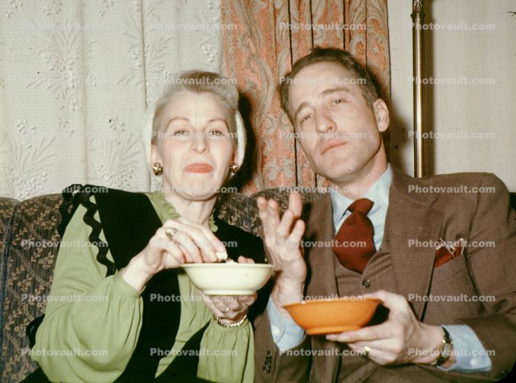 Noshing, Finger Food, Nuts, Bowl, Woman, Man, Suit, Tie, 1950s