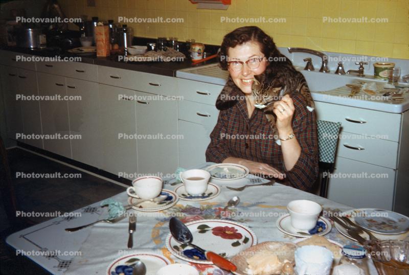 Woman Smiles with her Cat, Breakfast Table Setting, Coffee, Kitchen, 1950s