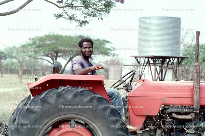 Man with Tractor, Water Tank, Madzongwe, Zimbabwe
