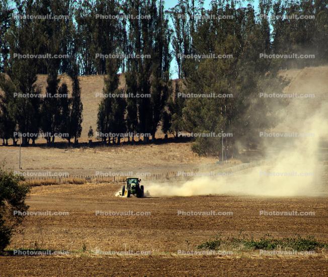 Dust, Tractors Plowing