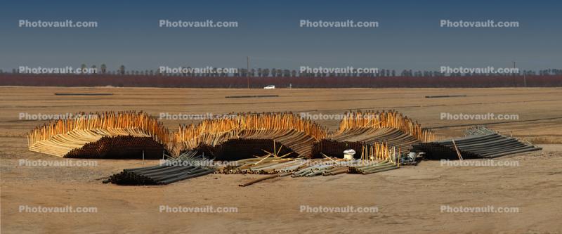 Water Irrigation Pipe Sections, stacked, farmland, sprinklers, Central Valley, Abstract