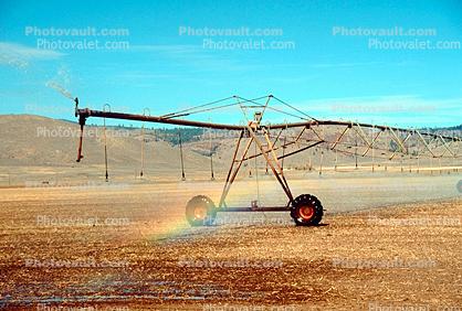 Irrigation, water, sprinkler, rainbow, near Susanville, California, Dirt, soil