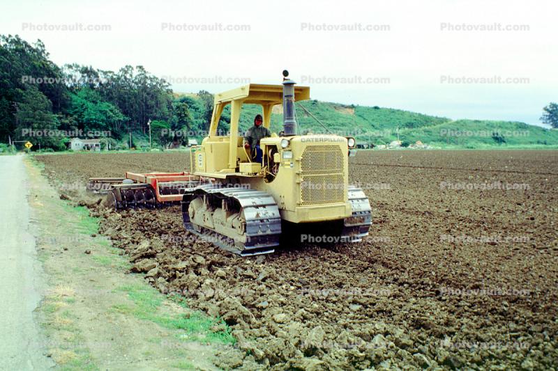 Harrow Disc Plow, Tilling the Soil, Tiller, Caterpillar Tractor, near Castroville, California