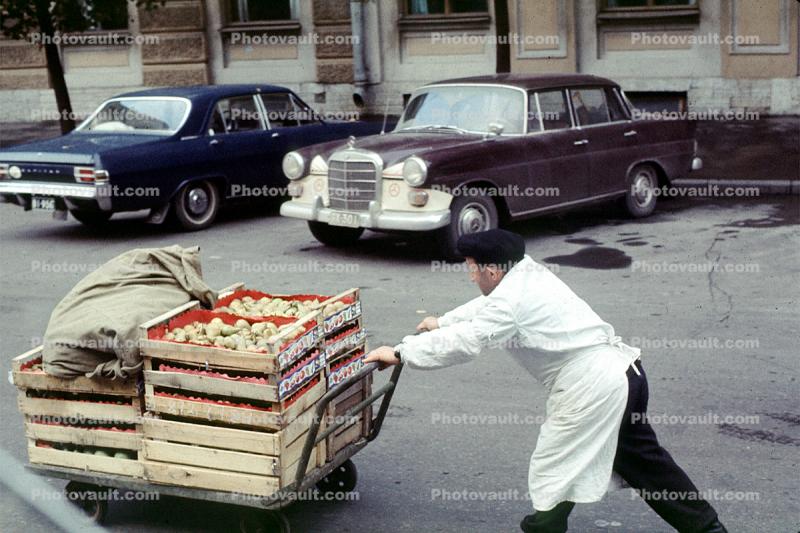 Man, Pushcart, car, vehicle, automobile, October 1969