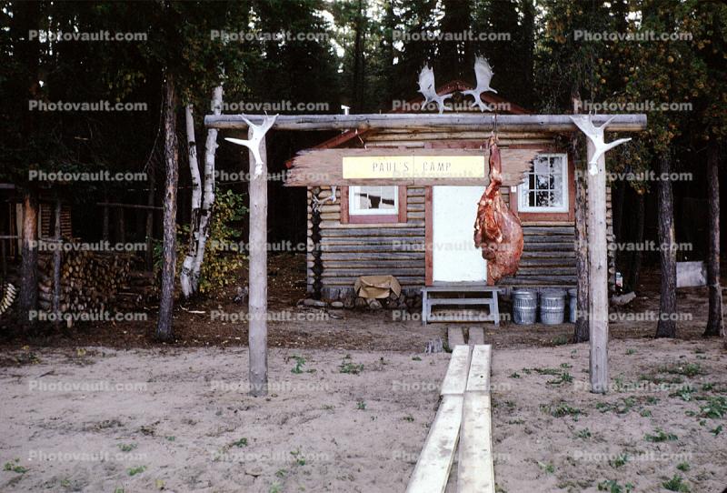 Paul's Camp, hanging meat, building, log cabin, Ontario, Canada