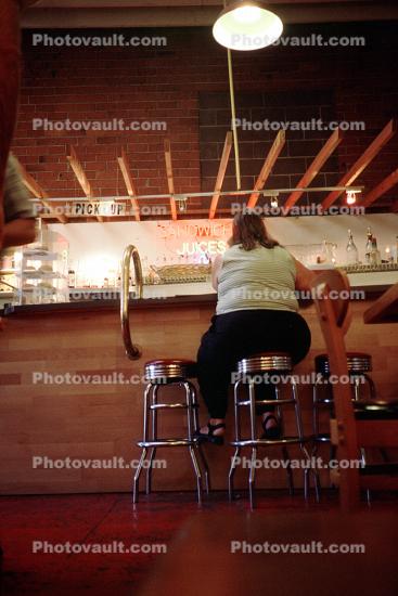 Woman at a Bar, butt, back, stools, bar