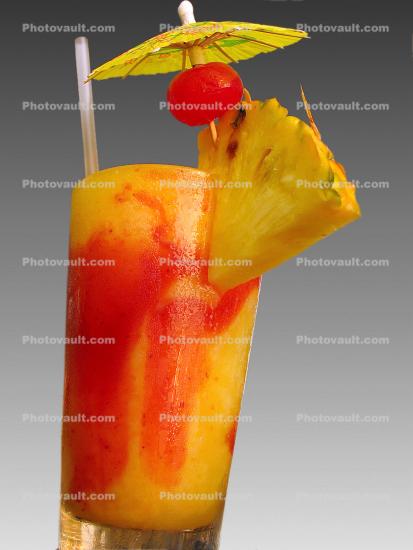 Pinapple drink, glass, ice, straw, drink