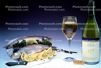 Fish, Trout, Lemons, knife, White Wine bottle, glass, bottle opener, cork, corker