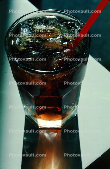 Coke in a glass, straw