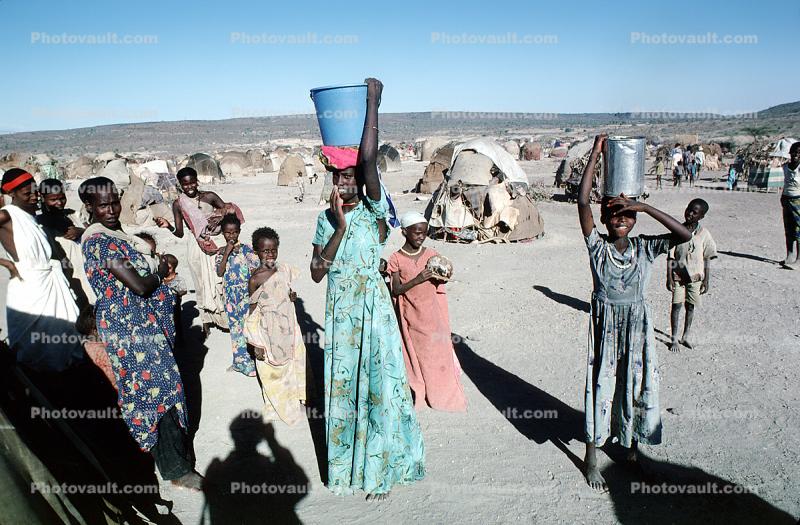 Women with Water Bucket, Refugee Camp, Somalia