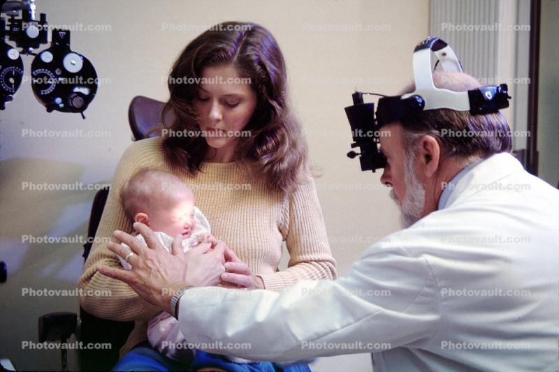 Mother with baby, toddler, Doctor, Eye Examination