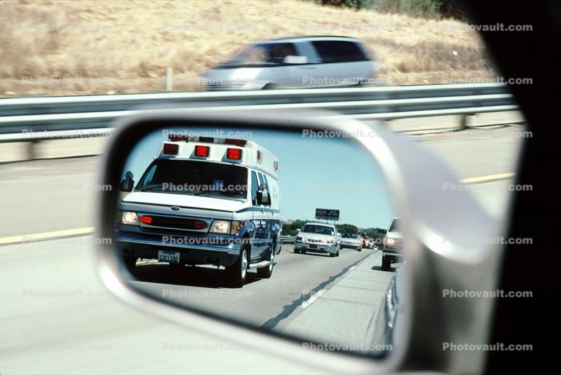 Ambulance in Mirror, flashing lights