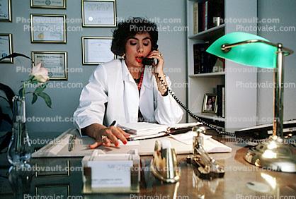Female Doctor on the phone