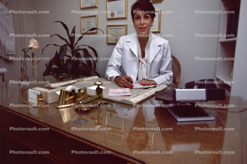 Woman Doctor at her Desk
