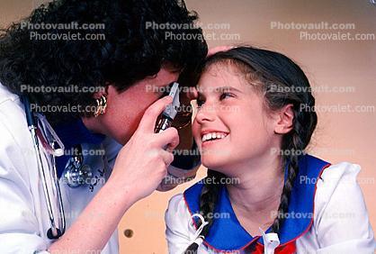 Doctor and girl patient, ear examination, otoscope, ear scope, Female, Woman