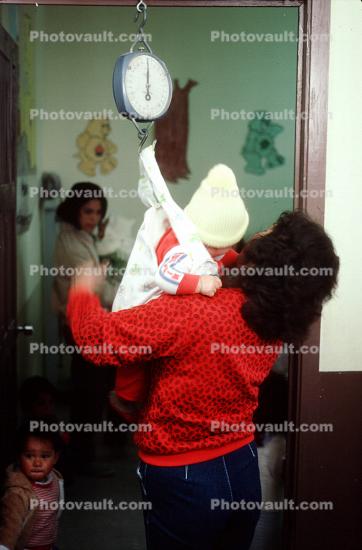 Weighing a Baby, Scale, Mother, toddler, Well Baby Clinic, Colonia Flores Magon