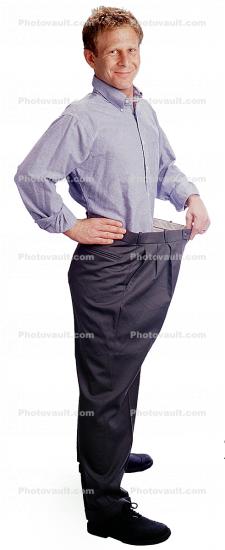 young woman in too big pants after successful weight loss Stock Photo |  Adobe Stock
