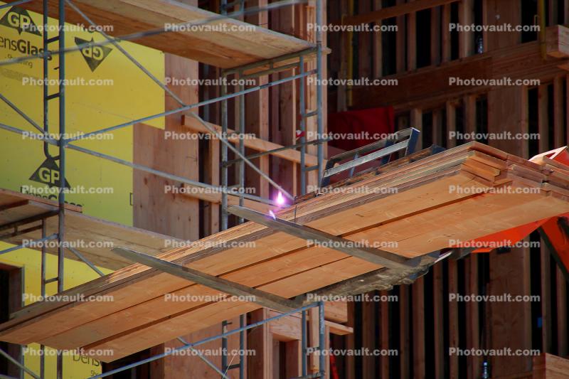 Telescopic Forklift, Telehandler delivers lumber, scaffolding