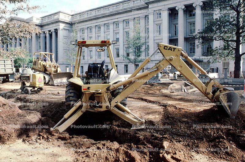 Caterpillar 416 Backhoe Loader, digging a ditch, government building, wheeled tractor, earthmover, earthmoving, dirt