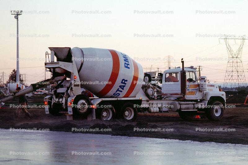 early morning pouring cement for a large floor, Cement Concrete Mixer