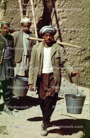 man walking, metal pail, Men, water pails, buckets, Afghanistan
