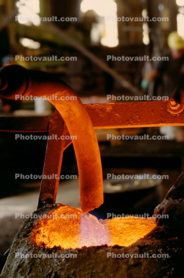 pouring molten metal, ladel, sparks