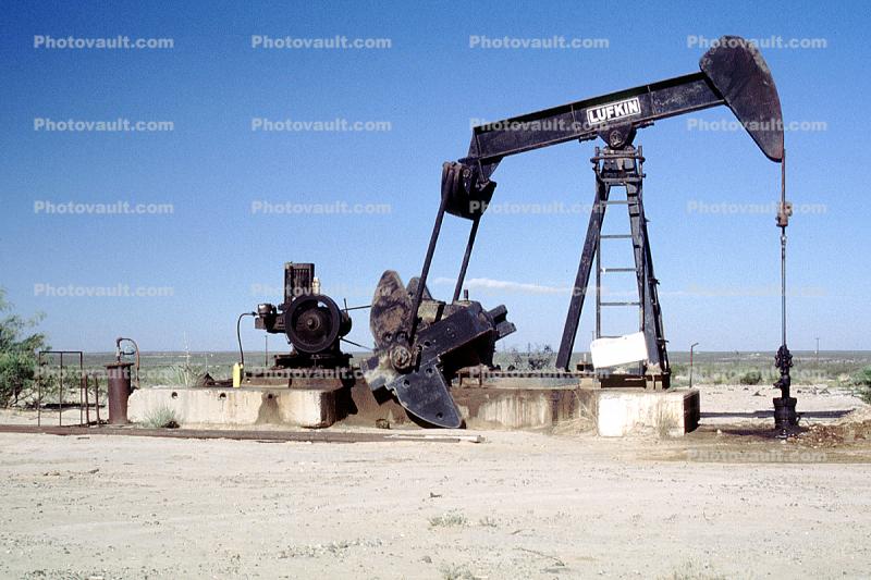 Pumpjack, also known as nodding donkeys, pumping units, horsehead pumps, beam pumps, sucker rod pumps (SRP), grasshopper pumps, thirsty birds and jack pumps, near Las Cruces New Mexico