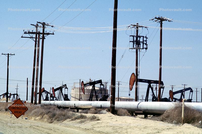 Pump Jack, Pipeline, Oil Storage Holding Tanks, northwest of Taft, California