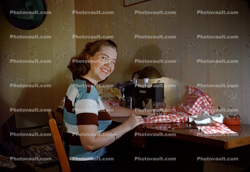 Sewing Machine, smiling woman, bullit bra, 1940s