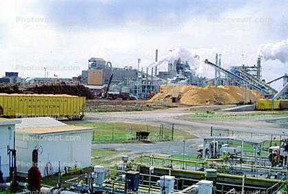 Smoke, Air Pollution, soot, Pulp Mill, sawdust mounds, buildings, Conveyer Belt