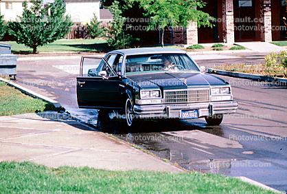 Dropping Children off for School, car, Cadillac, June 1984, 1980s