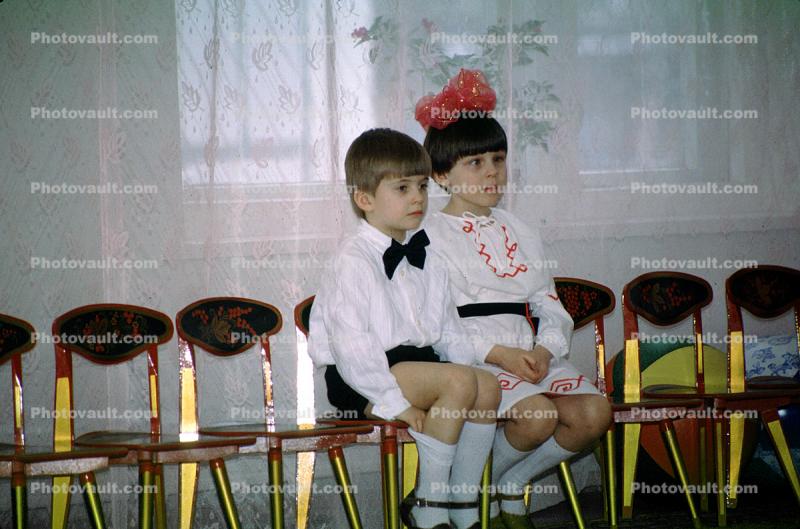 Russian kids in School, boy, girl, chairs