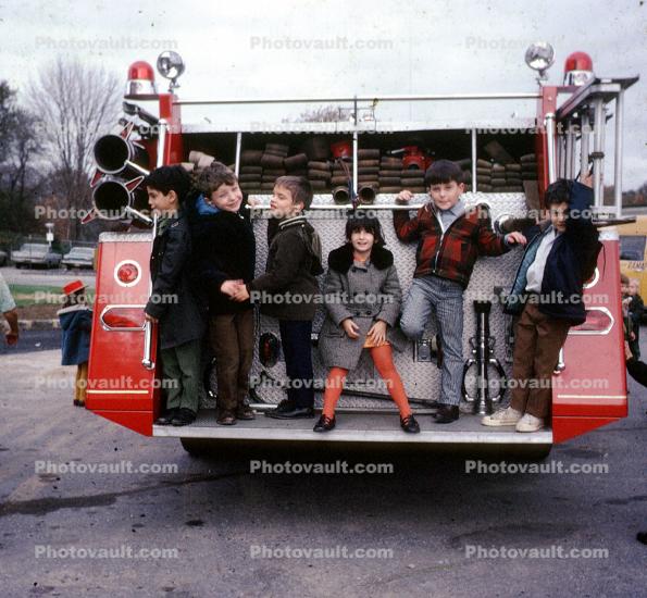 Portrait of Kids on a fire engine, Fairview Fire Dept., New York School for the Deaf