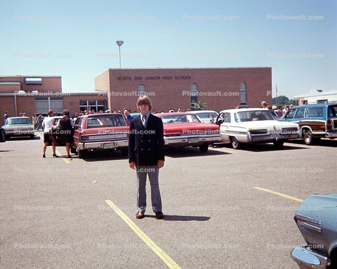 Cars in a Parking Lot, Boy in formal suit, Elkhart, 1960s