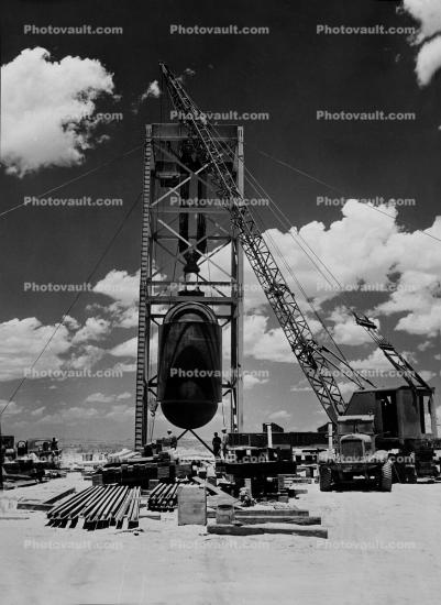 First Atom bomb, Trinity Test Site, prepping bomb for the first explosion test, crane, 1945, 1940s