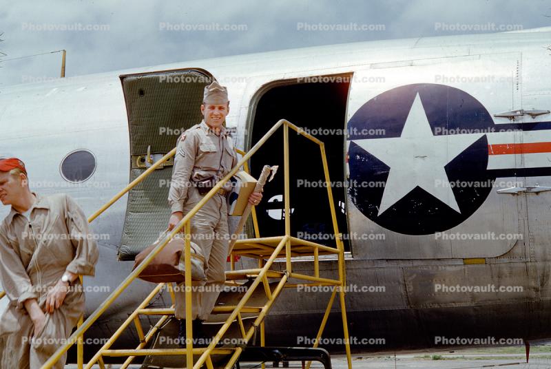 Air Force Man enters a C-54, Rondela, 1950s