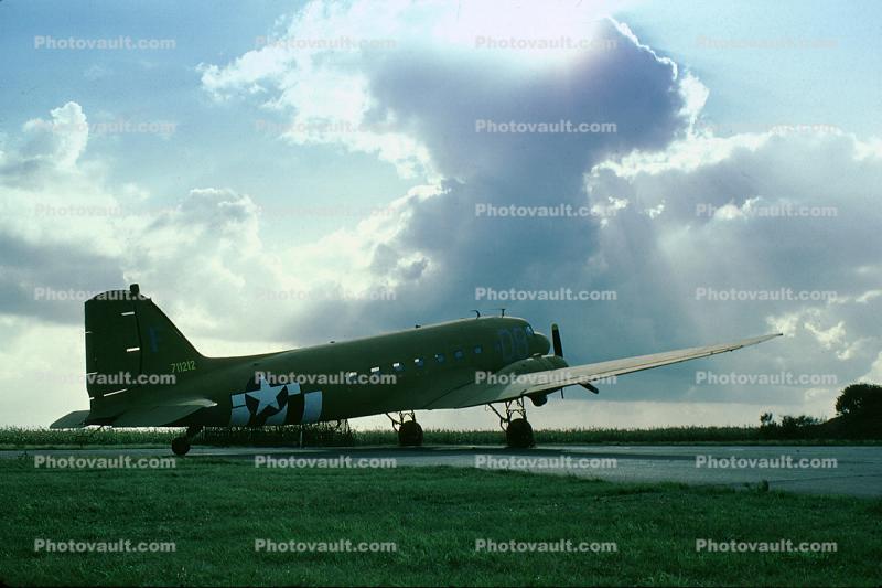 Cumulus Cloud thunders over the venerable C-47, USAF