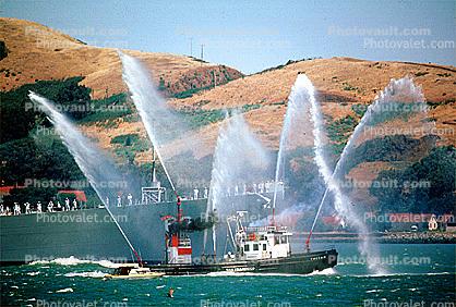 Fireboat Phoenix welcoming the USS Missouri (BB-63), Spraying Water