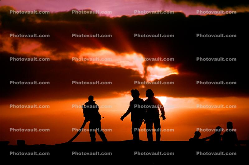 Sailors Moving a Hose, Sunset Clouds
