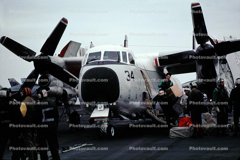 34, Grumman C-2 Greyhound, unloading cargo